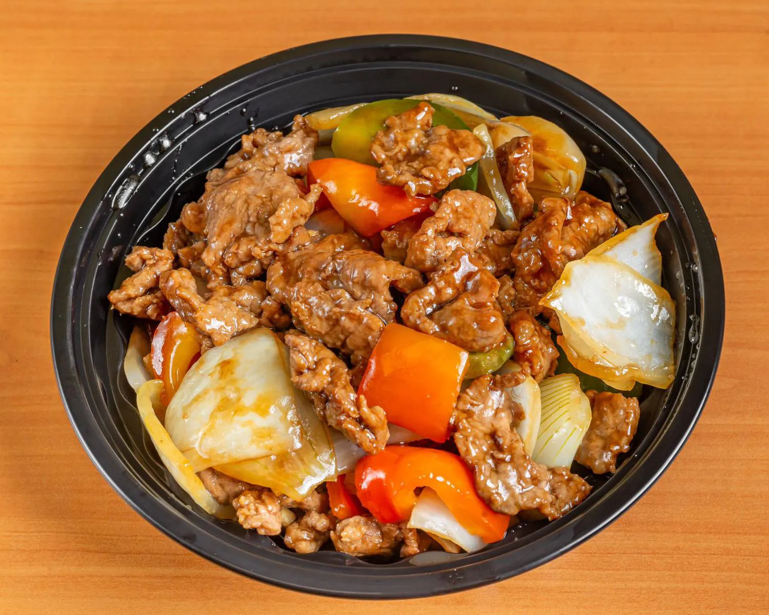 Beef with Colored Peppers and Onions at Kungfu Rice，a Asian Restaurant in Houston